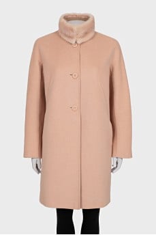 Pink coat with a fur collar