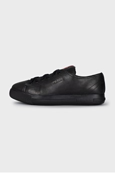 Leather sneakers with a silver logo