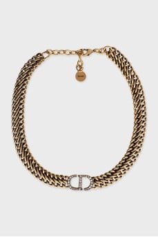 Gold choker with brand logo