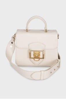 Leather bag with gold decor