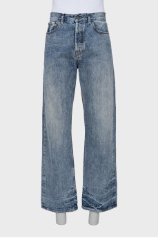 Men's blue jeans with a distressed effect