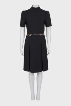 Black dress with gold trim on the belt