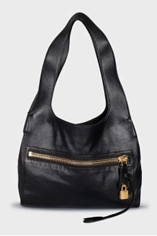 Leather bag with a gold lock