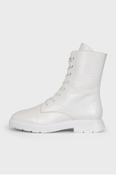 White boots with embossed leather