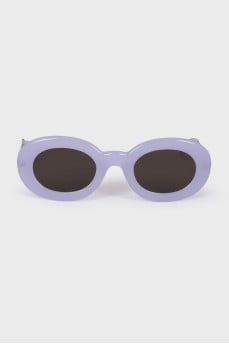 Sunglasses with a brand logo