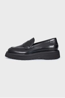 Black leather loafers