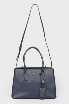 Blue bag with interior decoration of red leather