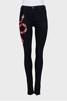 Skinny jeans with snake embroidery