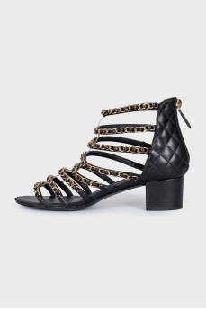 Leather sandals with chains