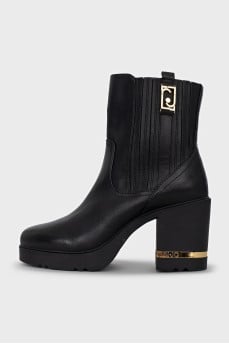Leather ankle boots with gold decor