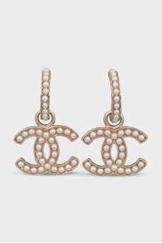 Gold earrings decorated with beads