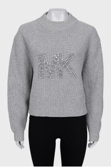 Knitted sweater with decorated logo