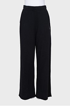 Sports pants with the brand logo