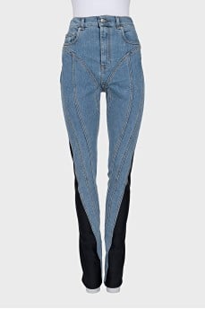 Jeans with black inserts and tag