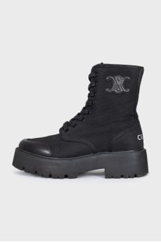 Textile boots with a brand logo