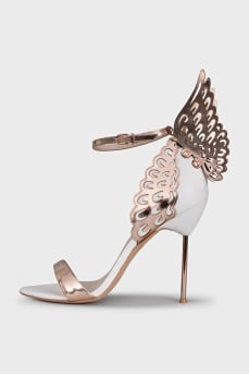 Leather sandals decorated with wings