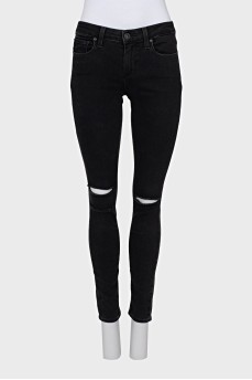 Skinny jeans with rips