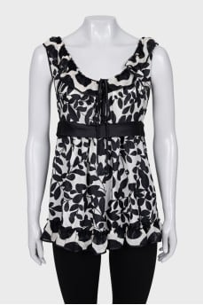 Black and white sleeveless blouse