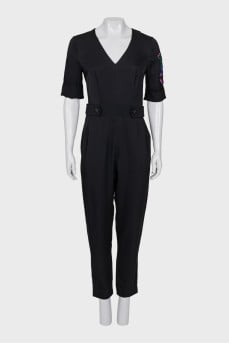 Black jumpsuit with a patch