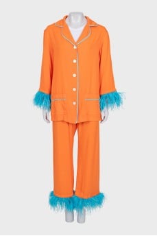 Orange suit with ostrich feathers