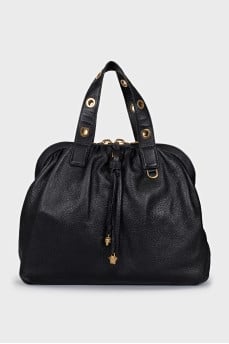 Leather bag with decorated handles
