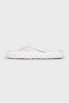Leather flip-flops with a shaped sole
