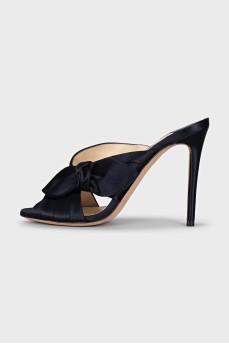 Black textile mules with a bow
