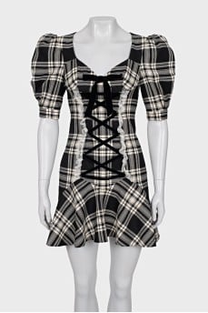 Plaid dress decorated with ties