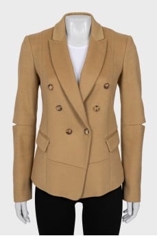Wool jacket with holes on the sleeves