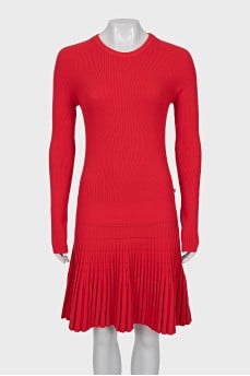 Red dress with pleated hem