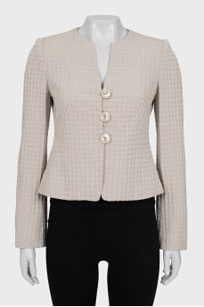 Beige jacket with a voluminous print
