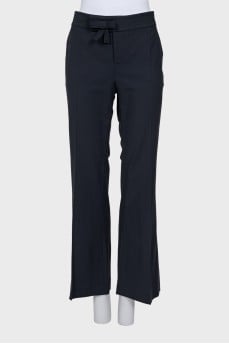 Flared trousers with a bow