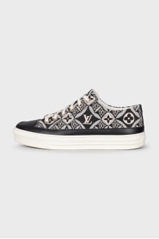 Blue textile sneakers with a signature print