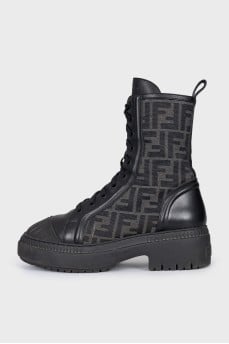 Leather boots with a signature print