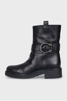 Black boots with metallic decor