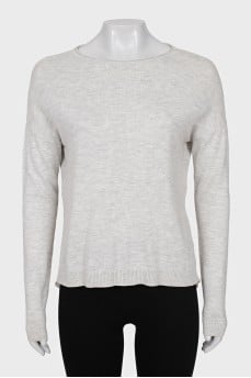Jumper decorated with pleats