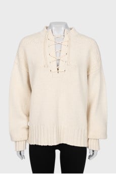 Lace-up jumper in wool and silk