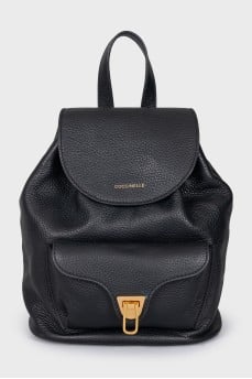 Black leather backpack with gold hardware