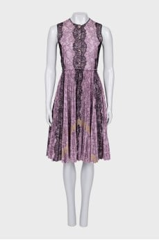 Lace dress with a pleated skirt