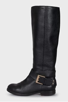 Black boots with a gold buckle