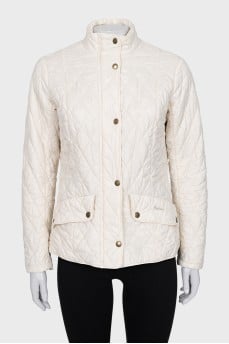 Quilted jacket with a high neck