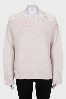 Wool jumper decorated with lace