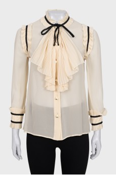 Sheer blouse with ruffles
