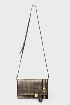 Bag with golden rivets