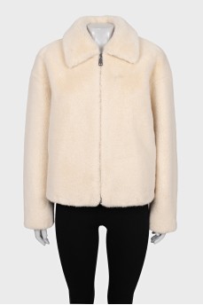 Short fur coat with a zipper