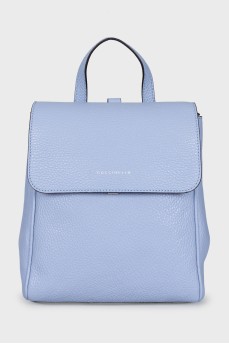 Blue backpack with a tag