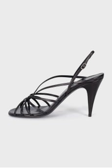Black leather sandals with braided pattern