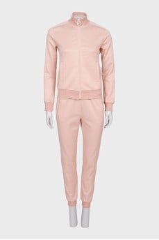 Pink suit with signature monogram