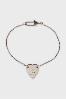 Silver bracelet with a heart