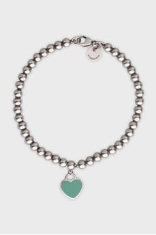 Silver bracelet with a heart pendant